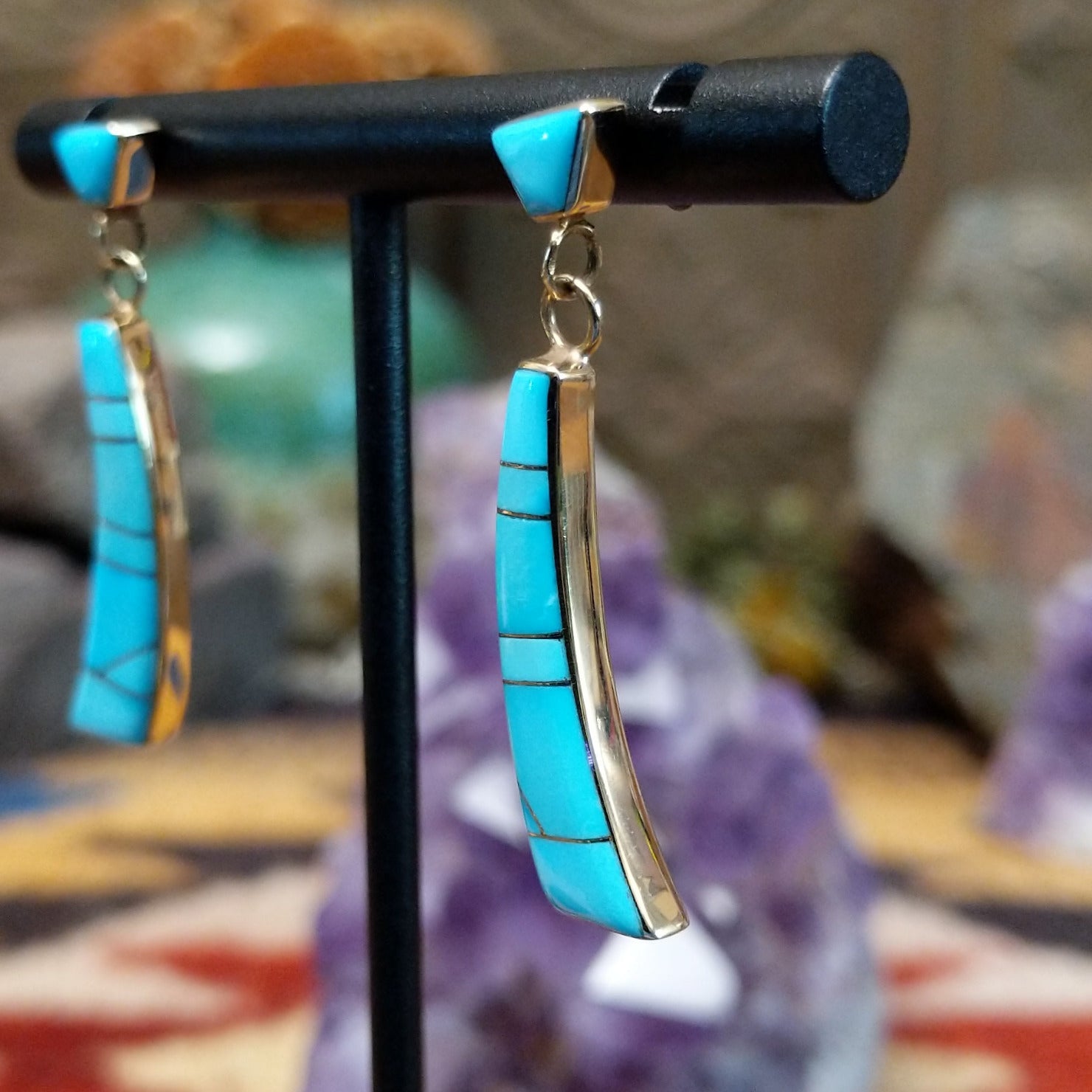 14kt gold Navajo dangle earrings with curved turquoise inlay panels.