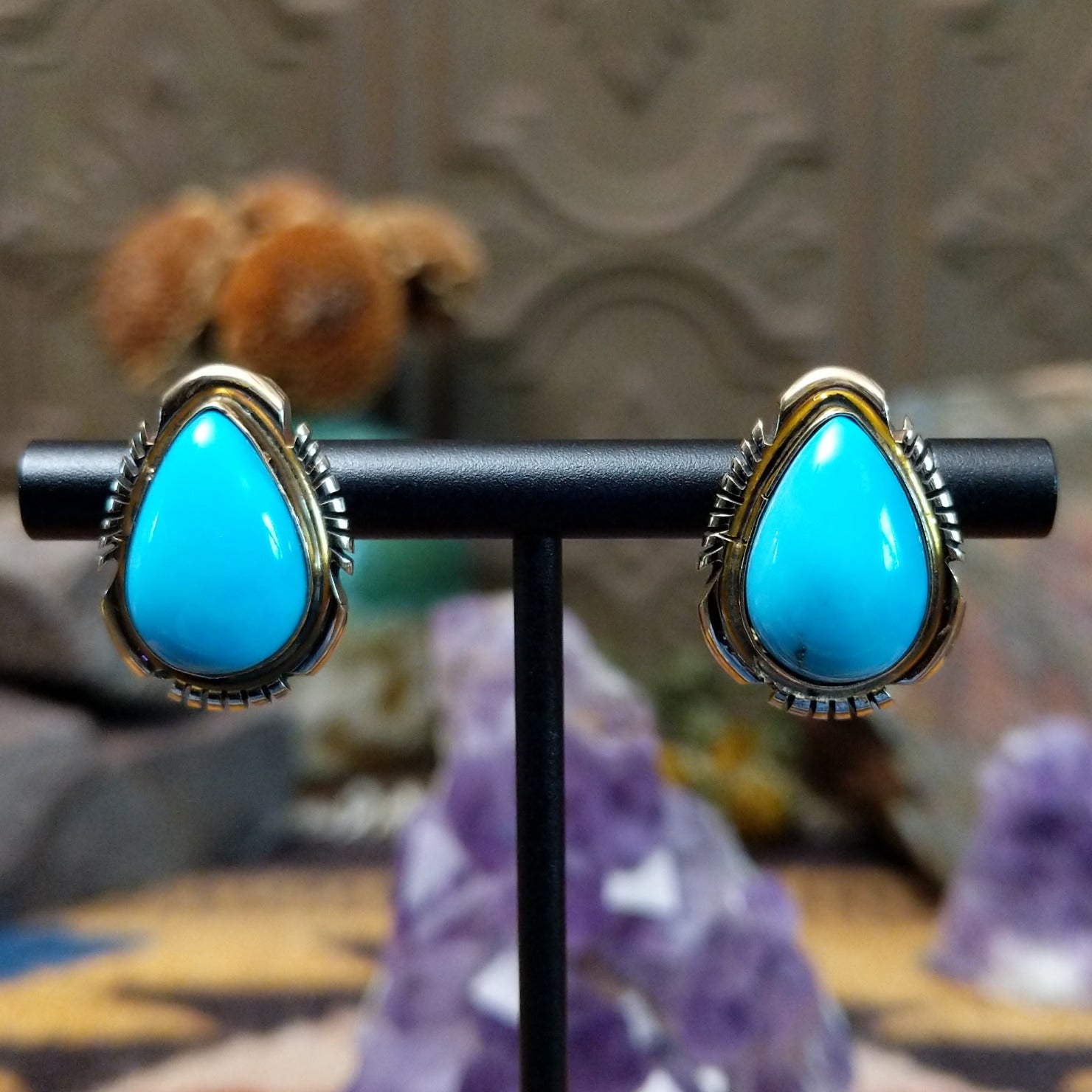 Navajo 14k gold teardrop earrings with turquoise stone and fan accents.