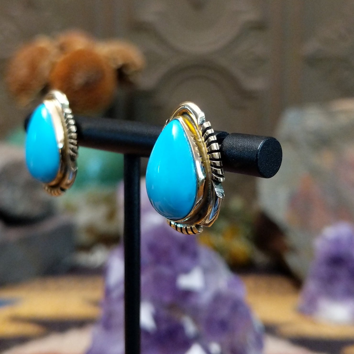 Navajo 14k gold teardrop earrings with turquoise stone and fan accents.