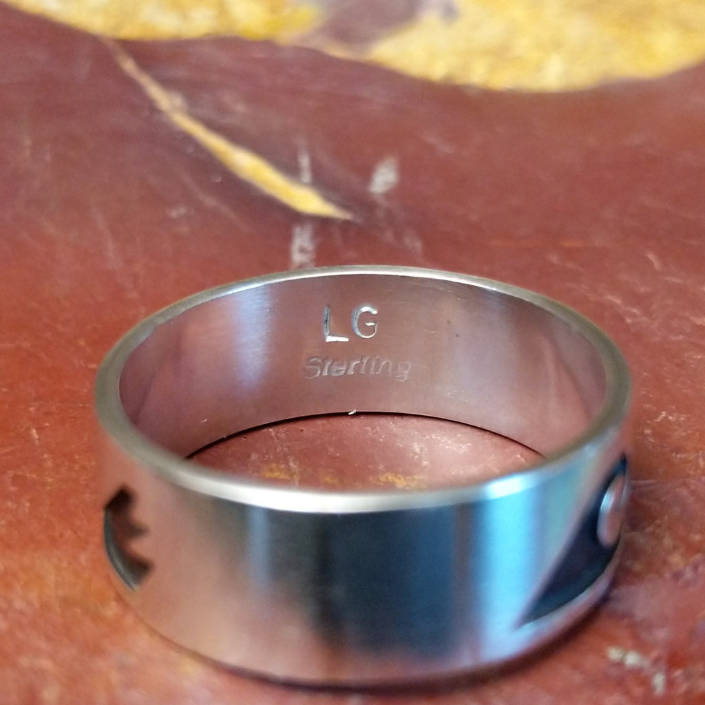 The interior of the band is stamped.