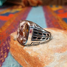 Navajo Wild Horse Ring with rectangular stone and geometric silver detailing.