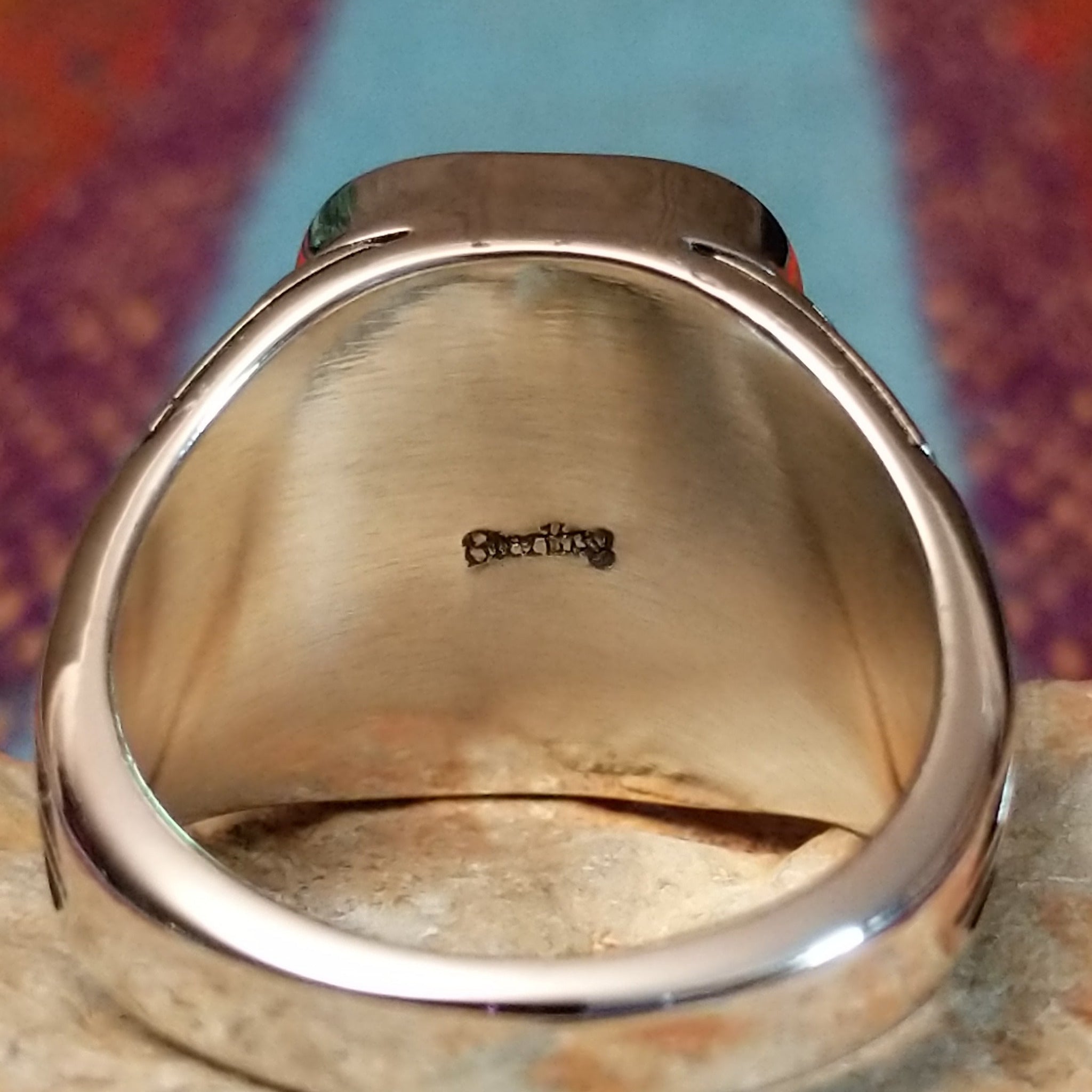 Close up of stamped ring composition