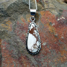 Handcrafted sterling silver Navajo Wild Horse teardrop pendant featuring a natural Wild Horse gemstone in a classic bezel setting.