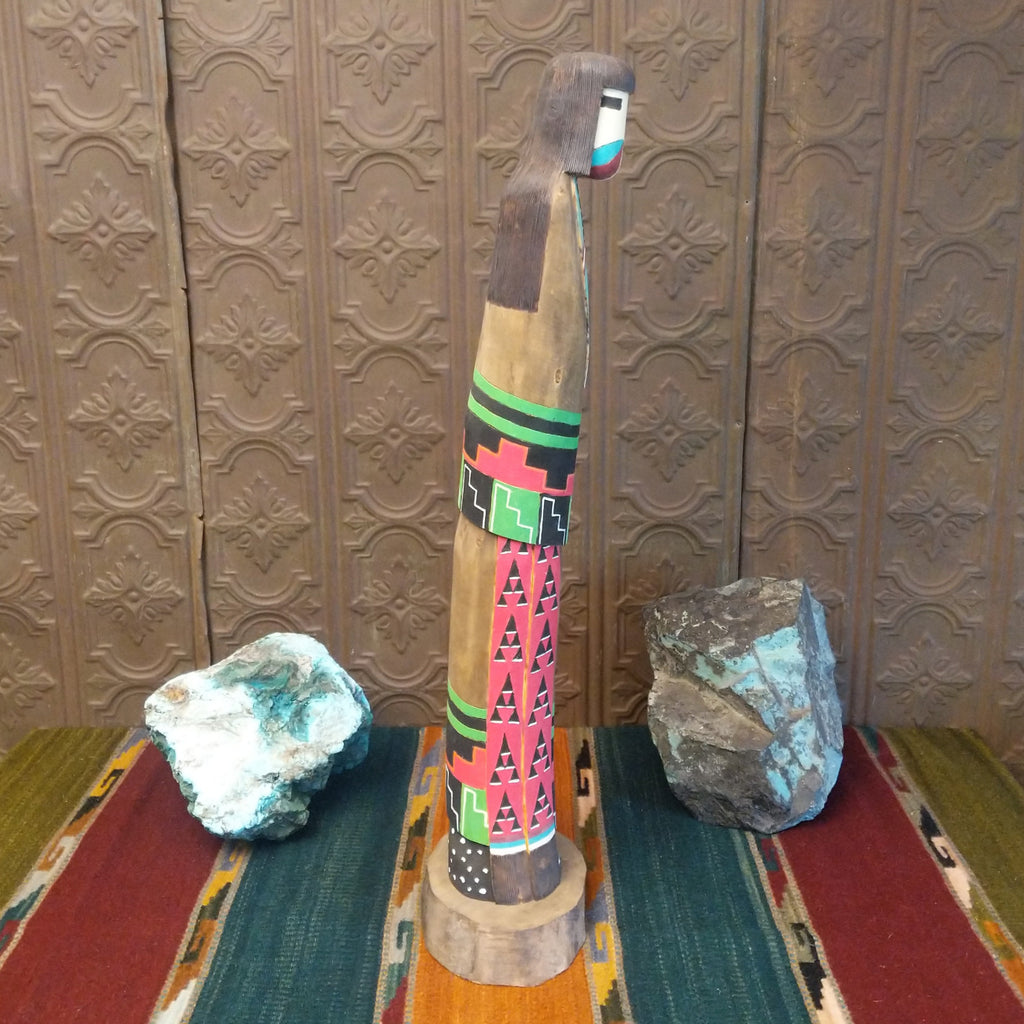 The shalako kachina features the vibrant colors and starry night patterns on the side.