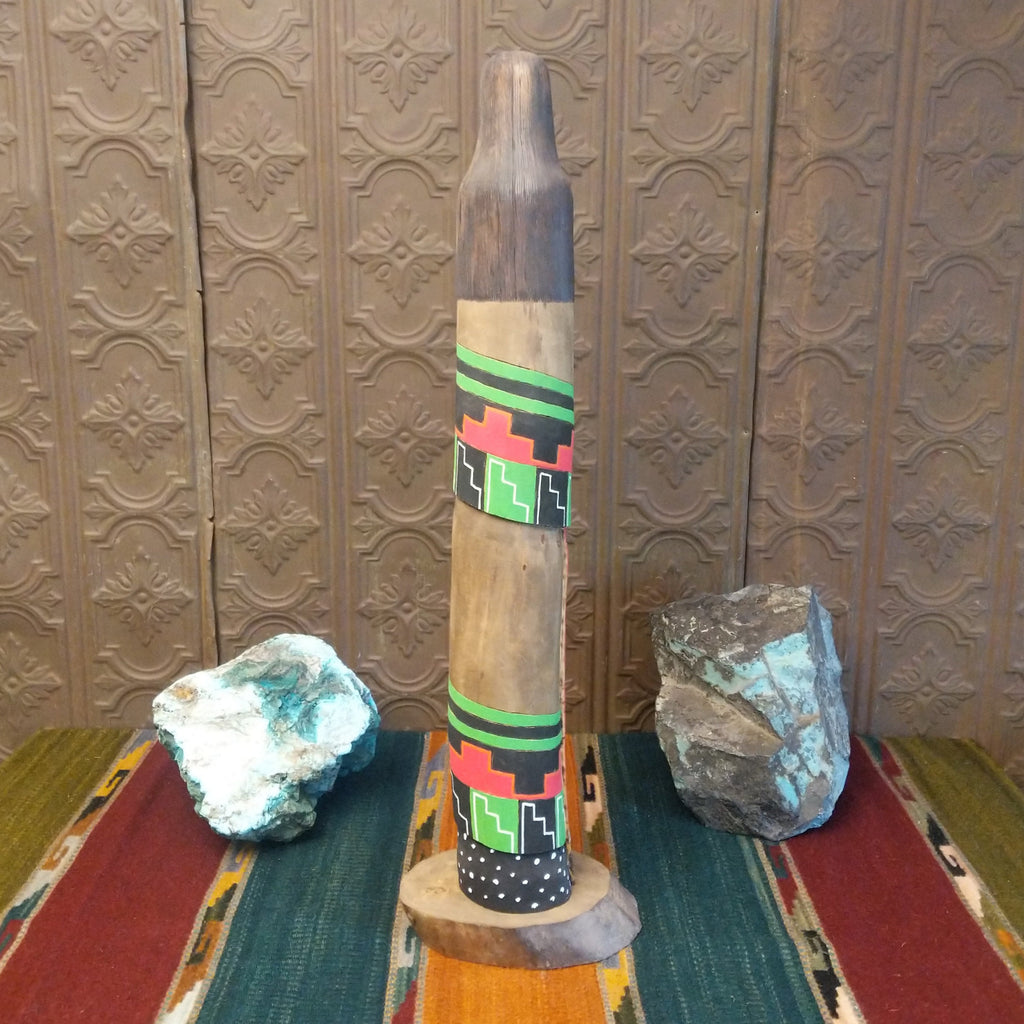 The shalako kachina features the vibrant colors and starry night patterns on the back.