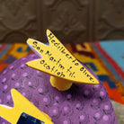 Base of Oaxacan bird wood carving signed by artist Hedilberto Olivera of San Martín Tilcajete, Oaxaca.