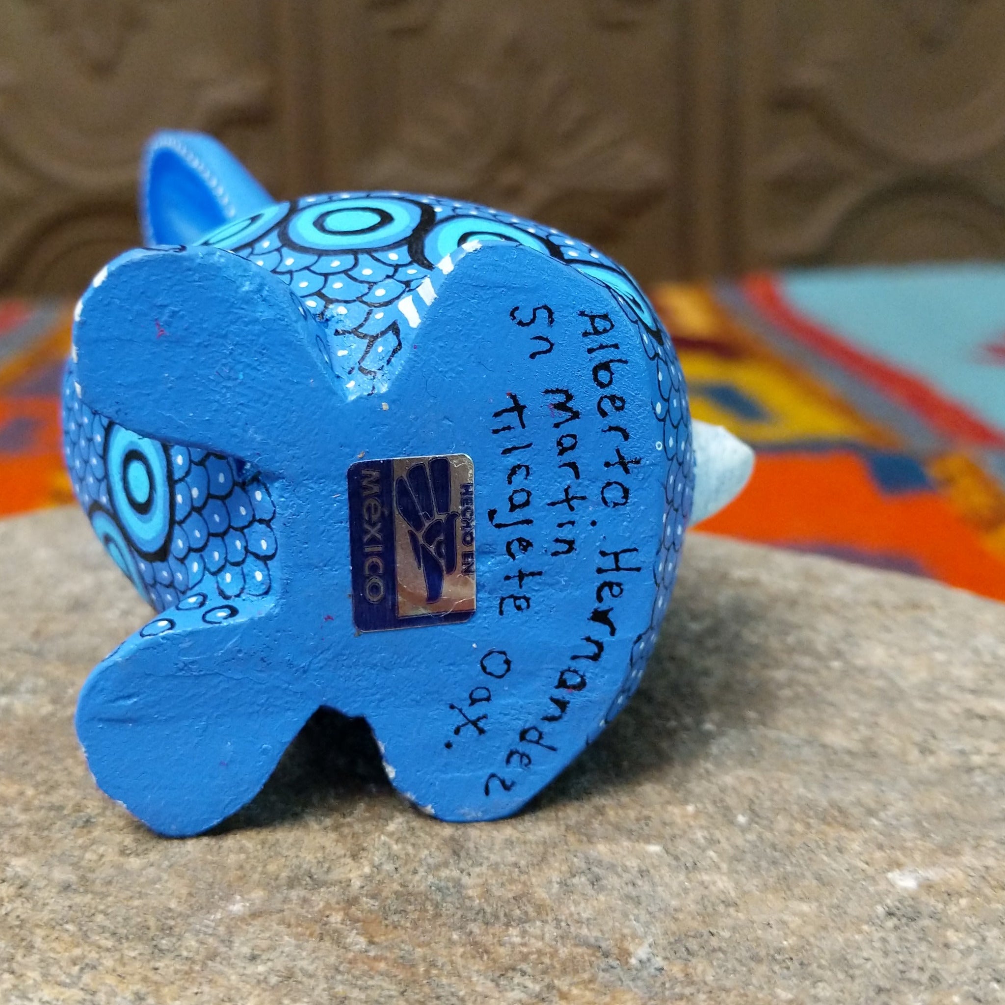 Base of Oaxacan bunny wood carving signed by Alberto Hernandez and marked San Martín Tilcajete, Oaxaca, Mexico.