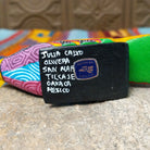 Black base signed by Julia Calvo Olivera and marked San Martín Tilcajete, Oaxaca, Mexico.