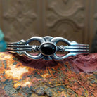 Sterling silver cuff featuring black onyx set in an oval bezel.
