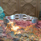 Sterling silver cuff featuring black onyx set in an oval bezel.