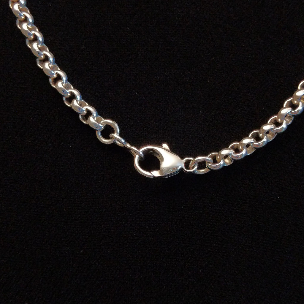 Close-up of the sterling silver clasp.