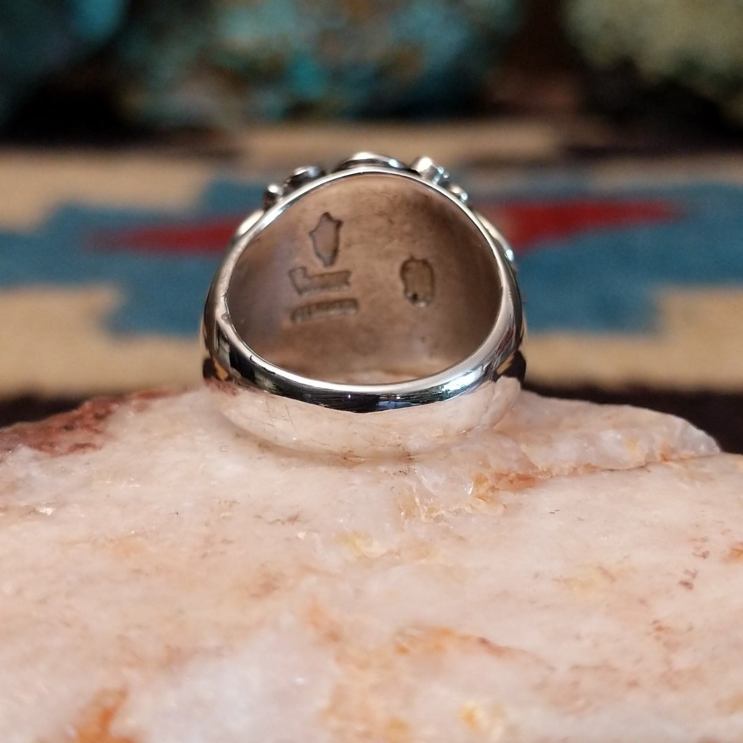 Sterling silver ring featuring orange spiny oyster shell.