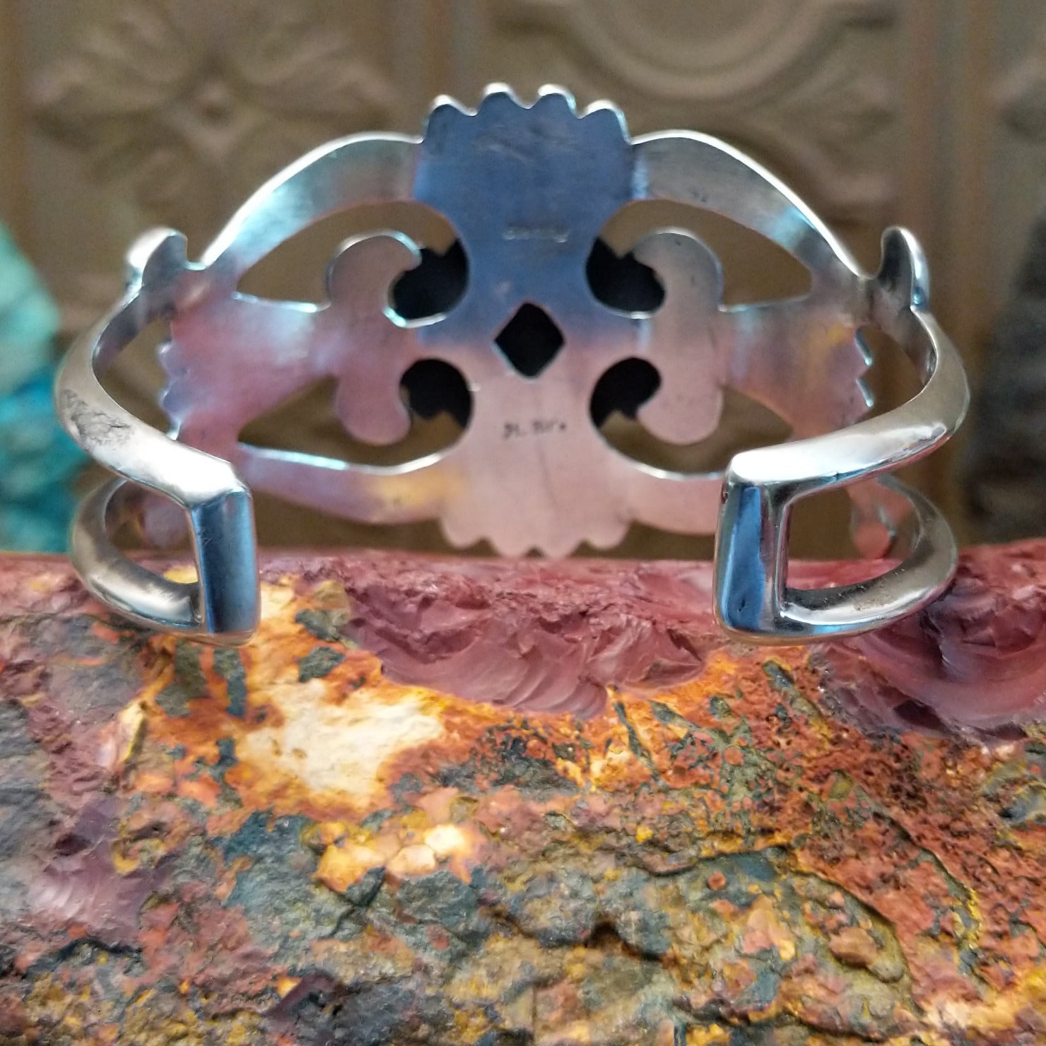 Sterling silver cuff featuring red spiny oyster shell set in the oval bezel.
