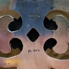 Close-up of the artists stamped signature.