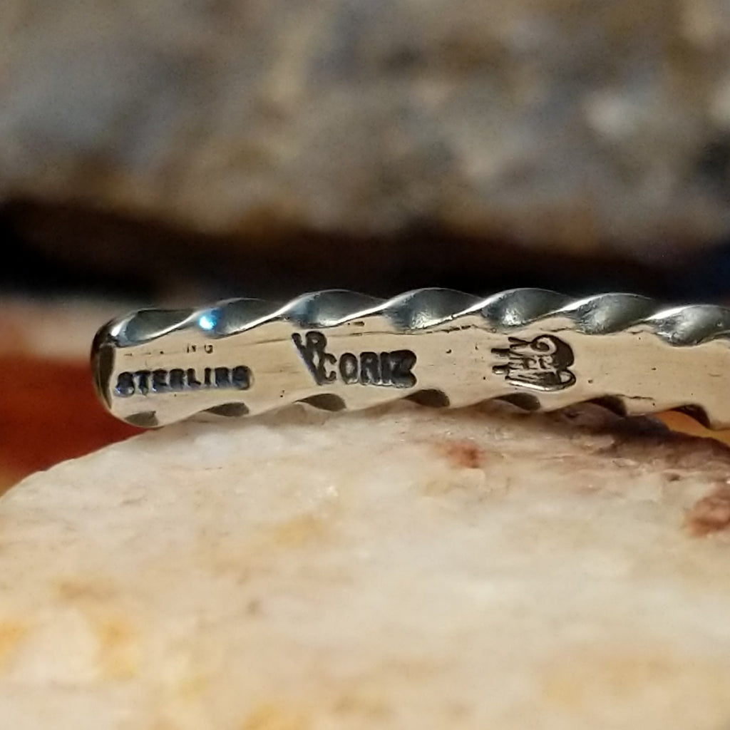 Close-up of the artisan's stamp.