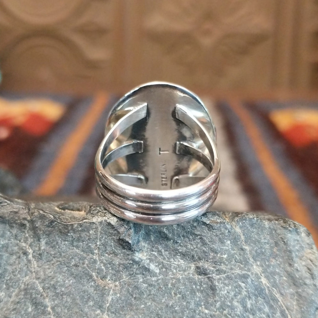 Polished layered band in sterling silver.