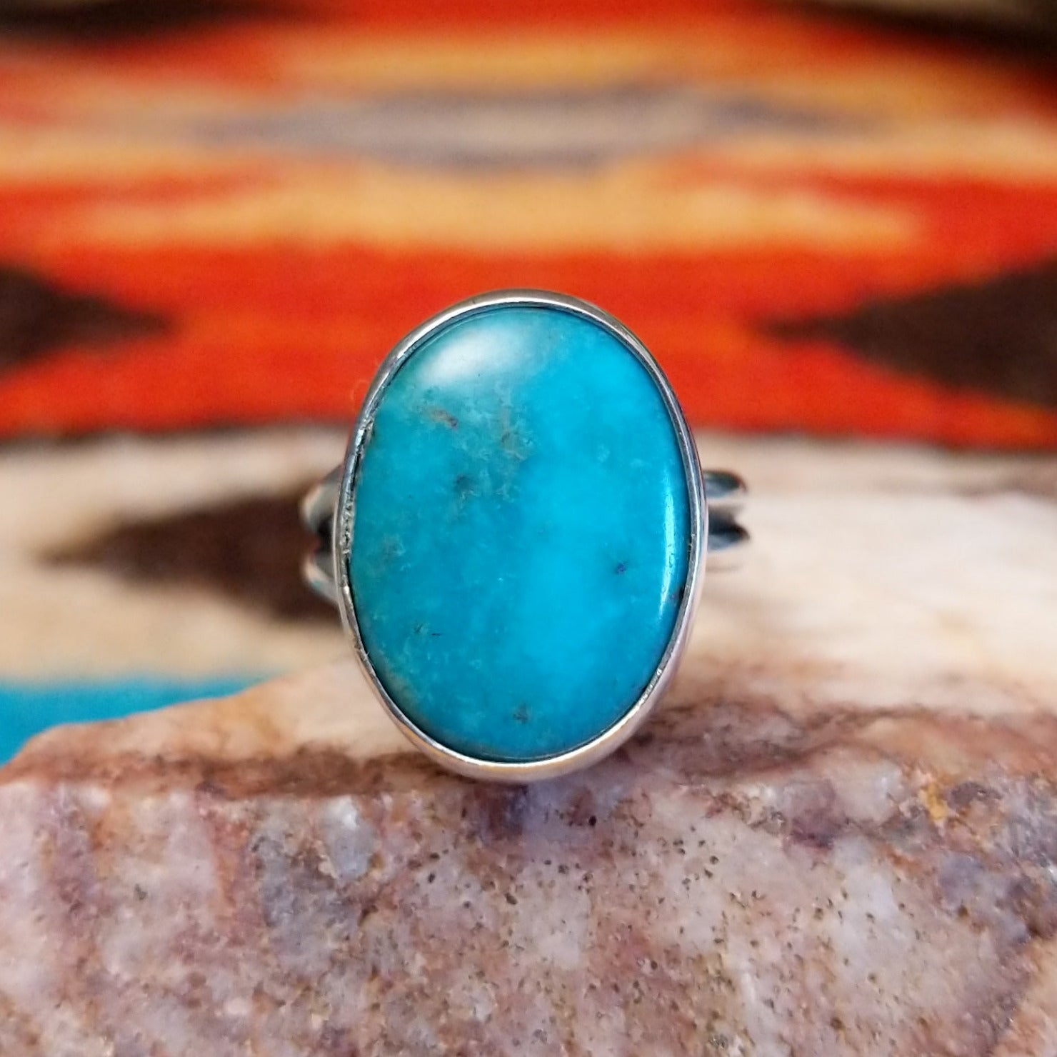 Sterling silver ring with Kingman turquoise set in the oval bezel.