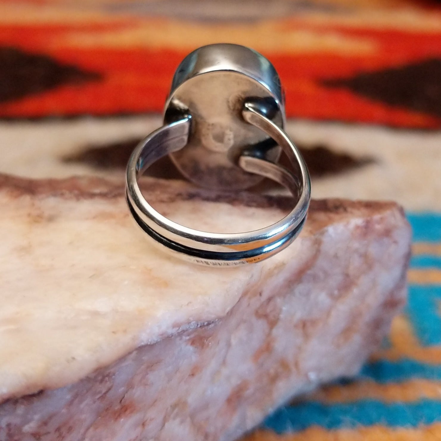 Sterling silver ring with Kingman turquoise set in the oval bezel.