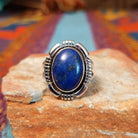 Oval lapis silver ring by Bernyse Chavez with graduated geometric silverwork.