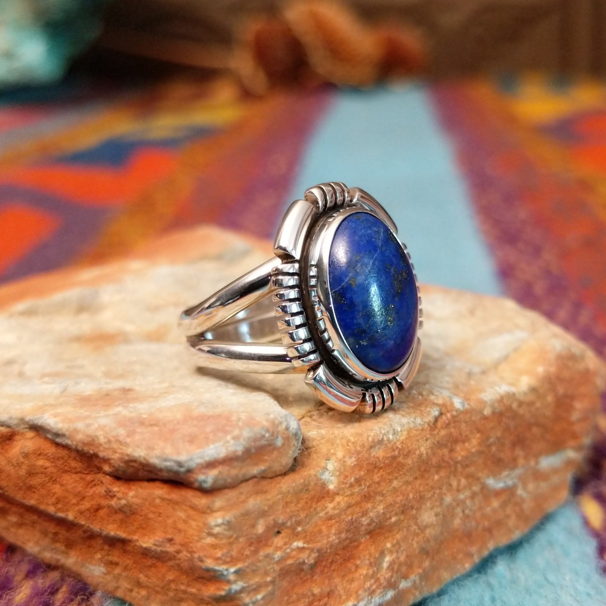 Oval lapis silver ring by Bernyse Chavez with graduated geometric silverwork.