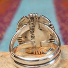 Close up of the artist's stamped signature