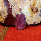 Oval purple spiny oyster shell set in sterling silver.