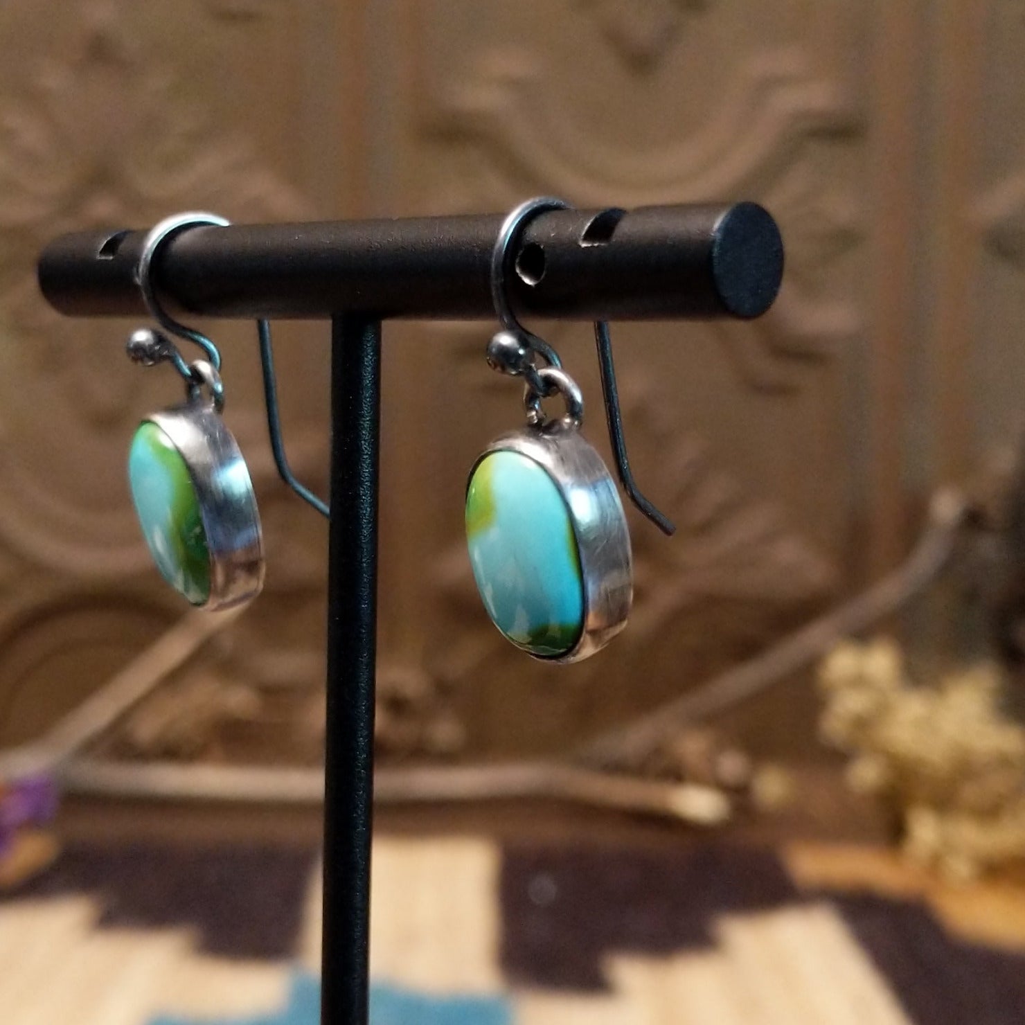 Sterling silver earrings with Sonoran gold turquoise set in oval bezels.