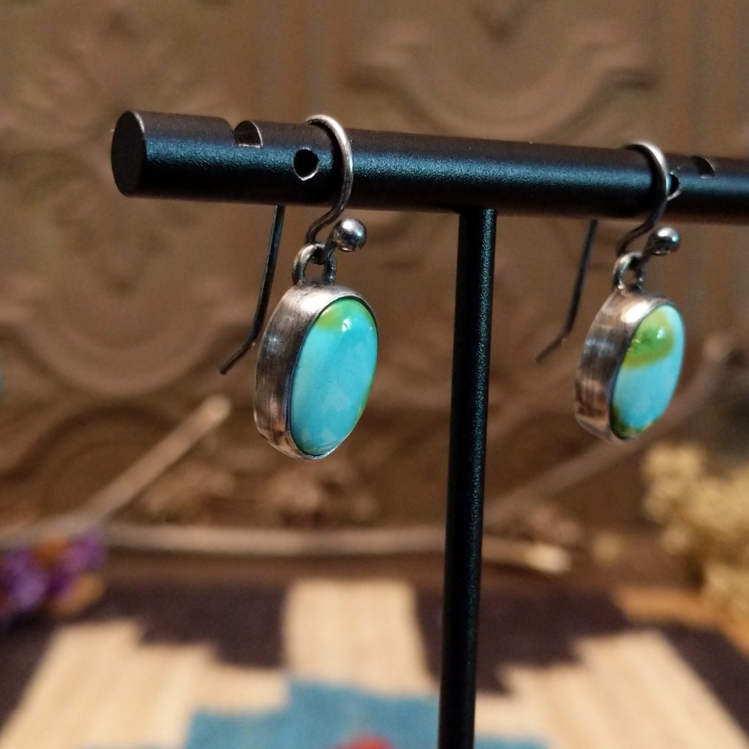 Sterling silver earrings with Sonoran gold turquoise set in oval bezels.