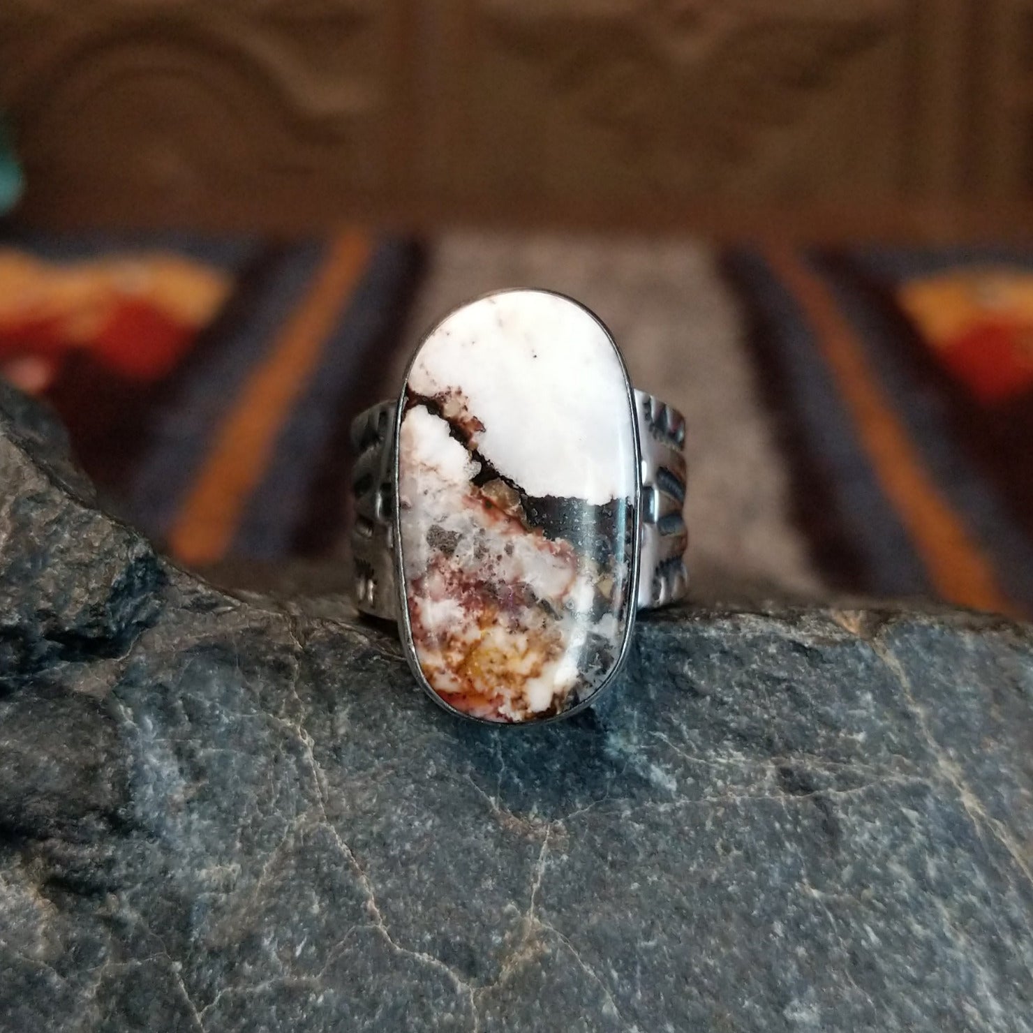 Front view of the Wild Horse stone set in a thin bezel.