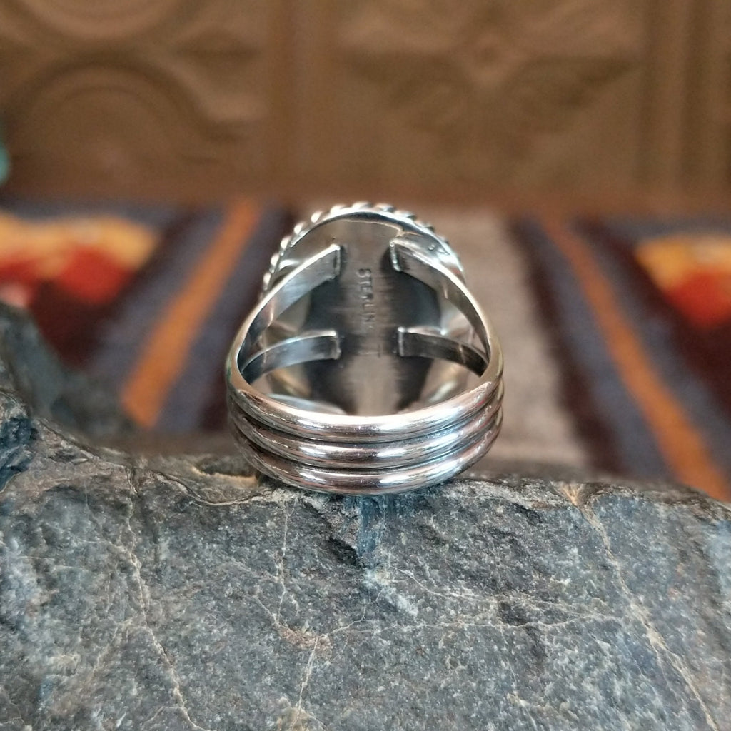 Layered sterling silver band of the ring.