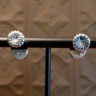 Close-up of the artisan's stamped signature.