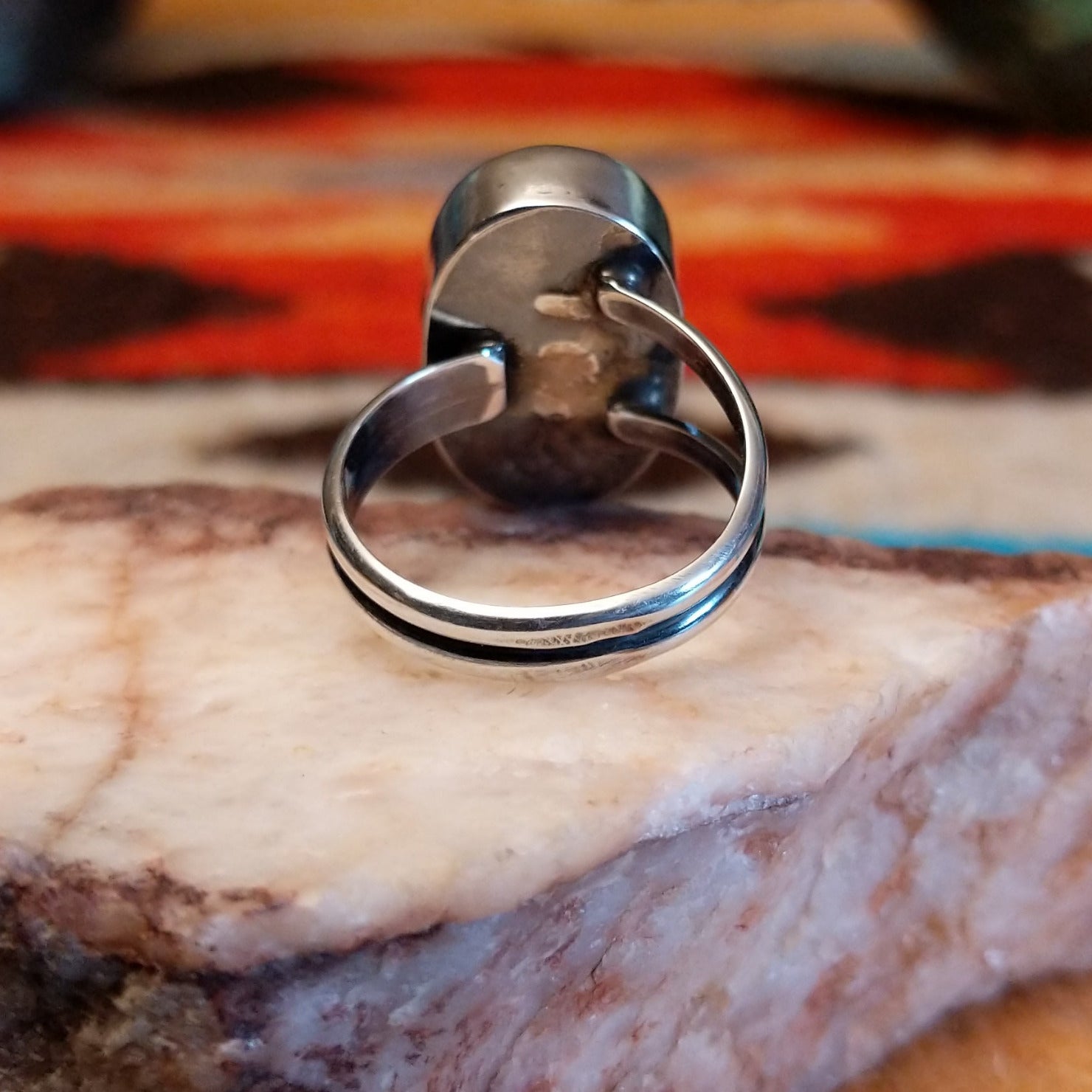 Sterling silver ring with Kingman turquoise set in the large oval bezel.