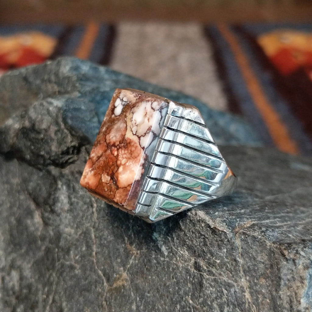 Rectangular ring showcases the stunning brown matrix of the wild horse.