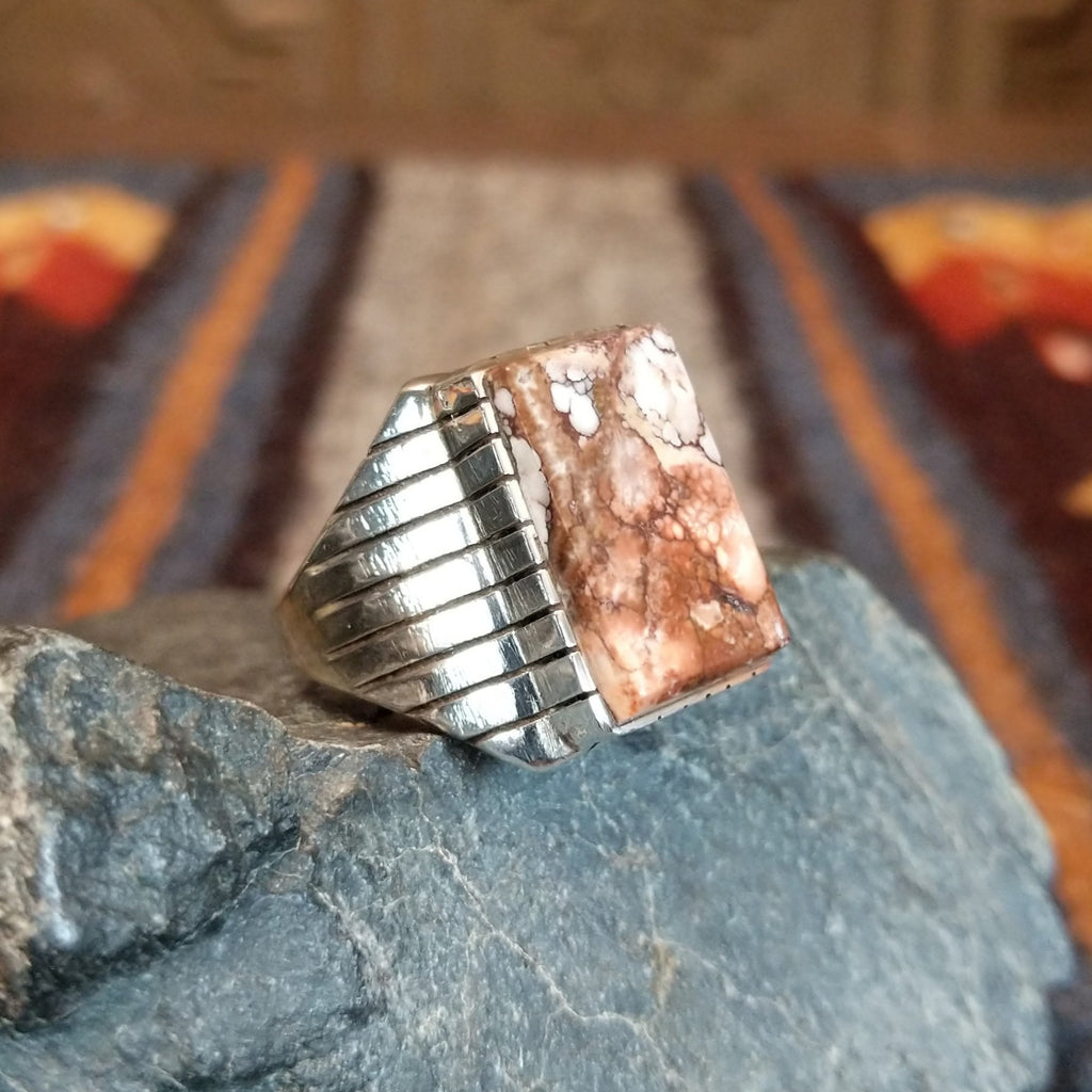 Rectangular ring showcases the stunning brown matrix of the wild horse.