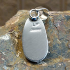Artisan and Sterling Silver stamp on back.
