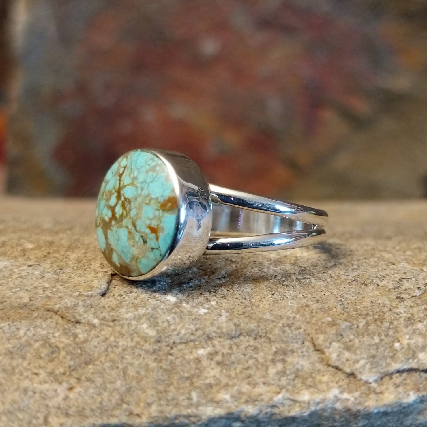 This Navajo-made ring features genuine #8 Turquoise set in sterling silver