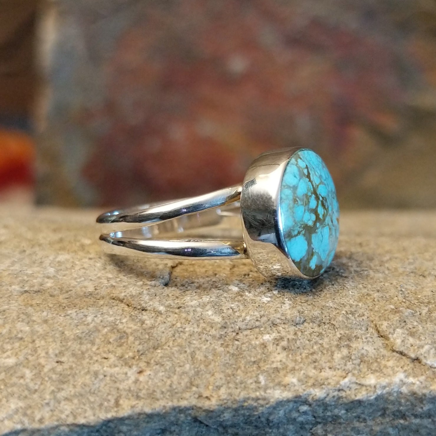 This Navajo-made ring features genuine #8 Turquoise set in sterling silver