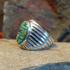  Navajo turquoise and Sterling silver inlay ring by L.C., size 11.  Detail on band.