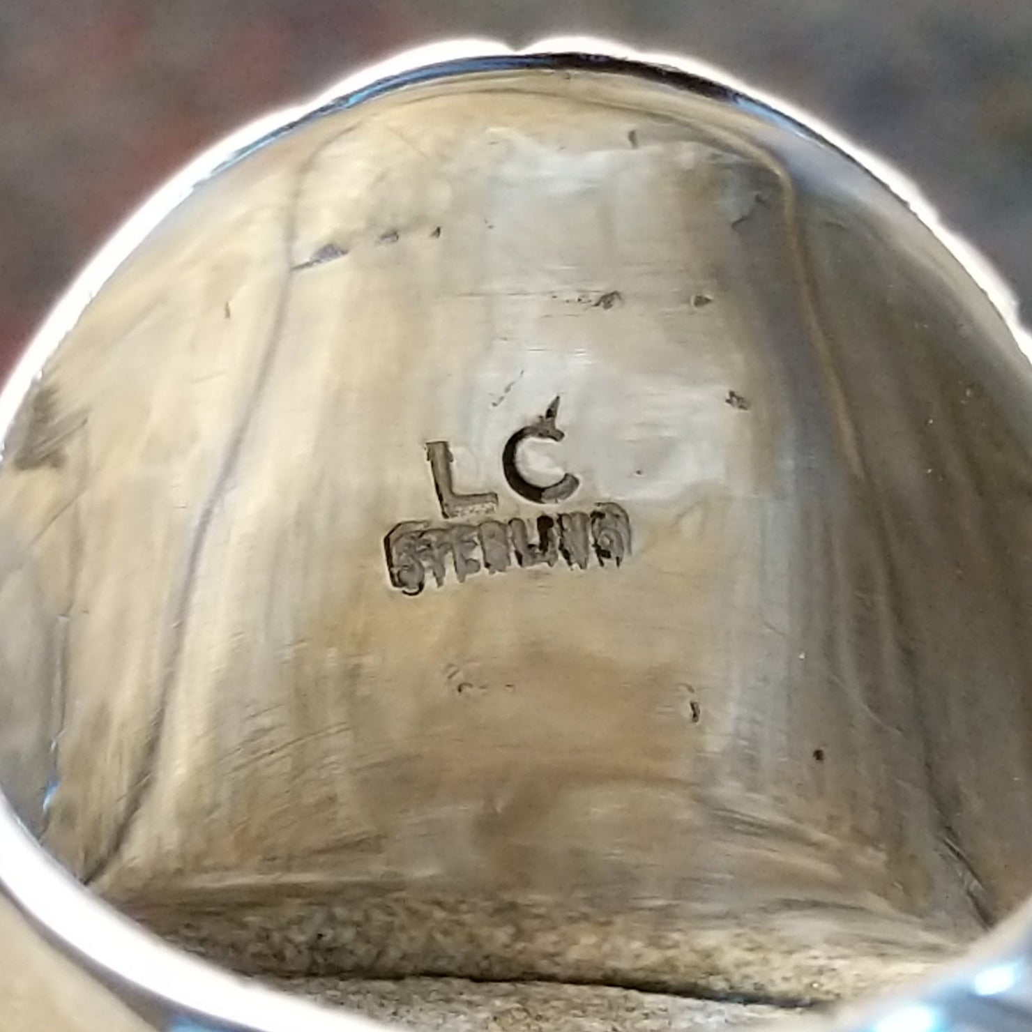 Artisan and Sterling Stamp on underside of ring.