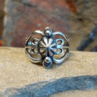 Sterling silver ring by Navajo artist Raymond Coriz, crafted in solid sterling silver. Size 13