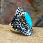 Stamped Sterling silver turquoise ring by Fred Charley; size 12 side view.