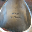 Sterling Silver and Artisan stamp, underside of ring.