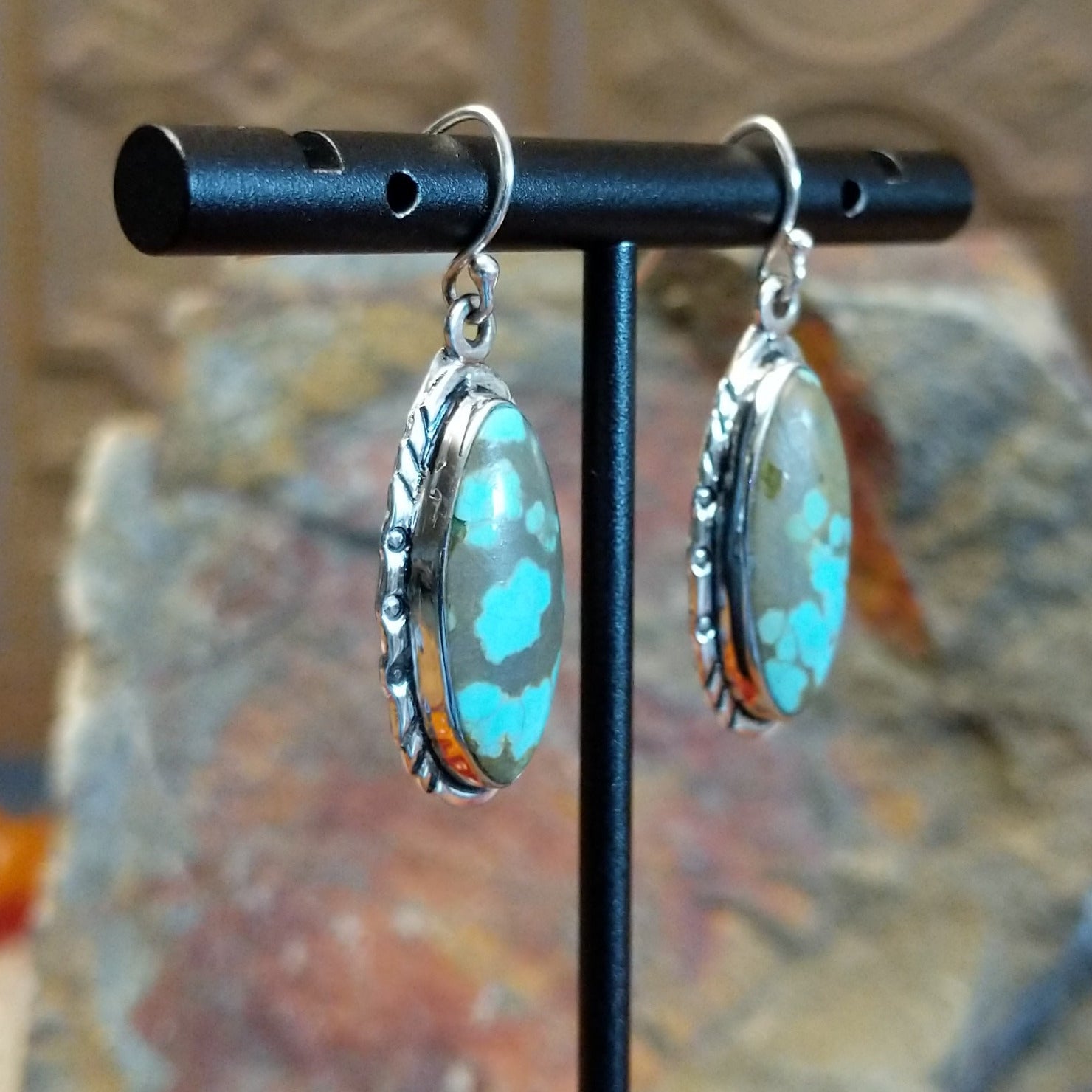  #8 Turquoise ellipse French hook earrings by Navajo artist John King, side view.