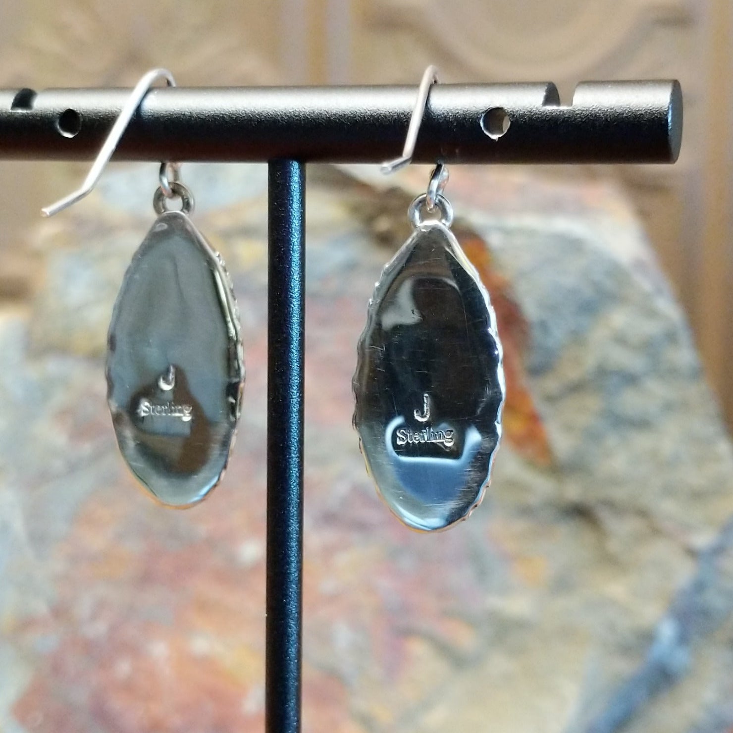 Artisan and Sterling Silver stamp on back.