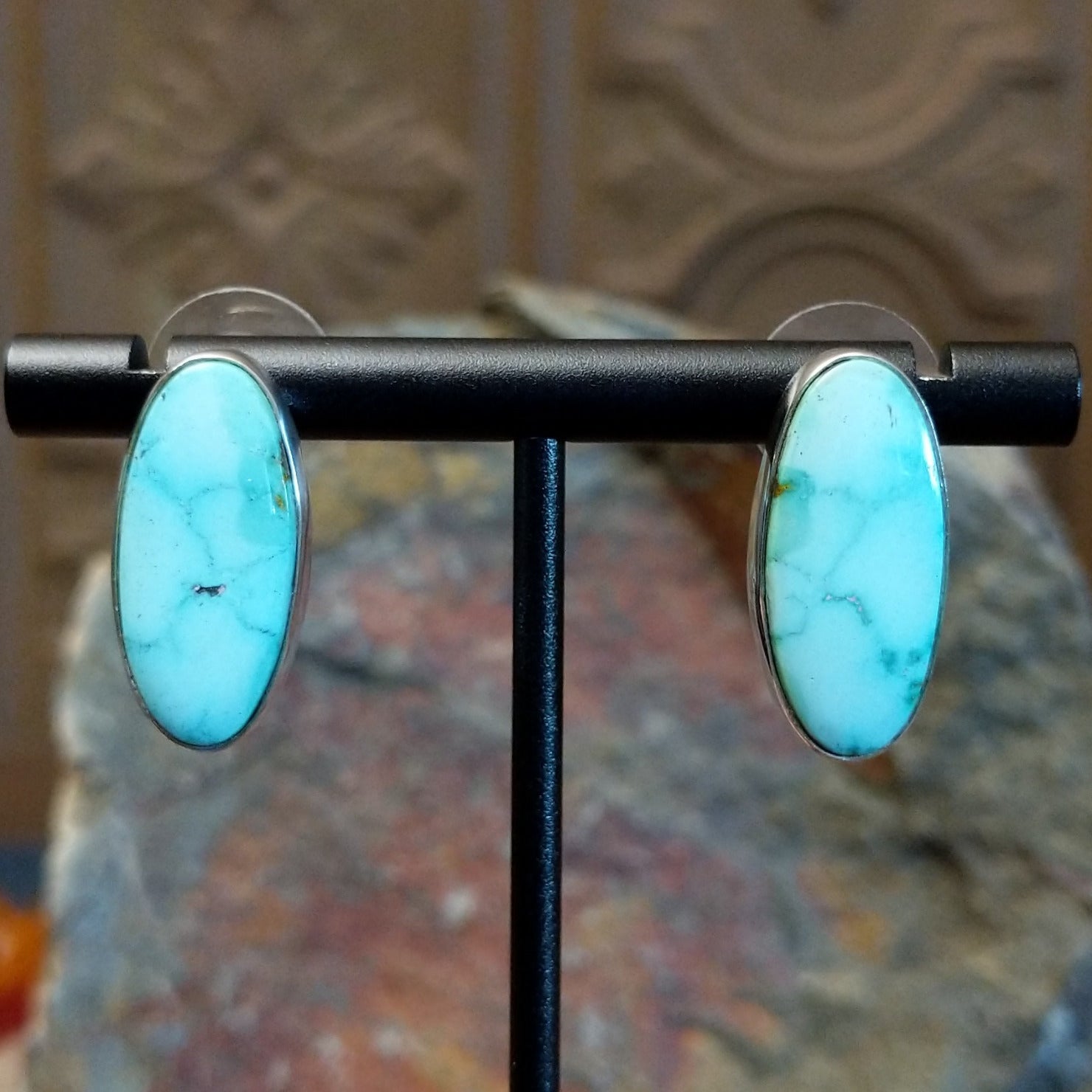 Turquoise Mountain turquoise ellipse earrings by Navajo artist Ann Curley.