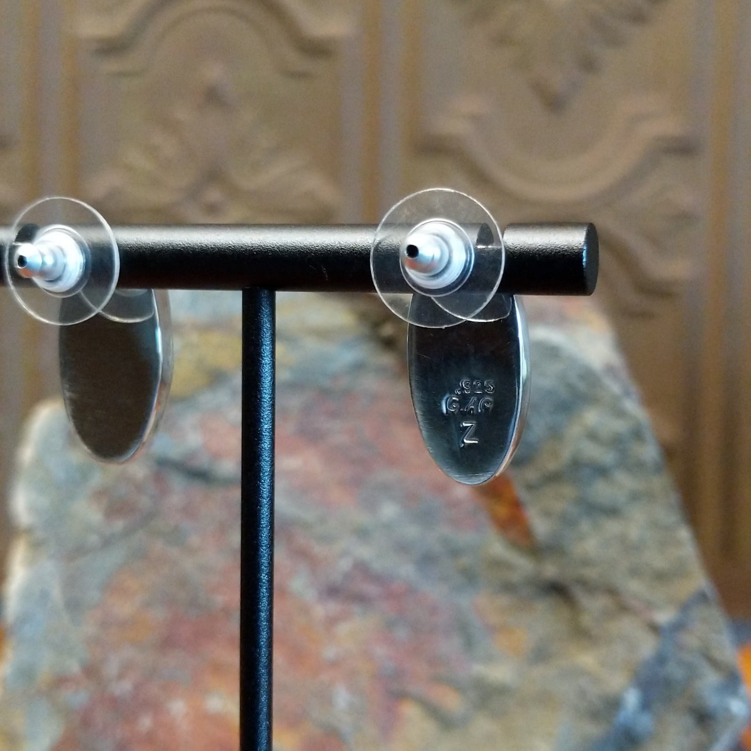 Artisan and Sterling Silver stamp on back.