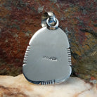 Artisan and Sterling Silver stamp on back.