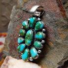 multi-stone Sonoran Gold turquoise pendant by Navajo artist Angela Martin, handcrafted in sterling silver - side view.