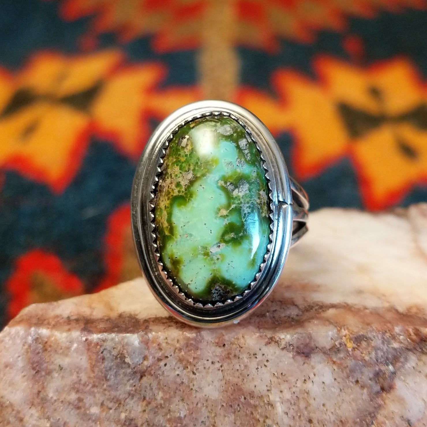 Sonoran Gold Turquoise oval stone set in sterling silver by artist Roie Jaque, Size 6.