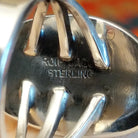 Artisan and Sterling Silver stamp on underside of ring.
